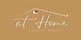 AT HOME LUXURY REALTY